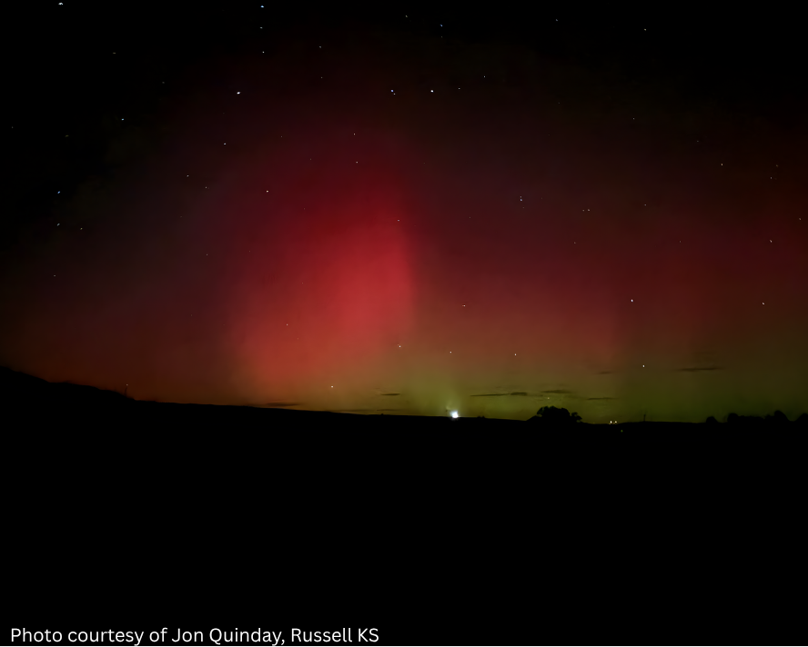 Northern lights glowing above the horizon in Russell, Kansas, on November 12, 2025.