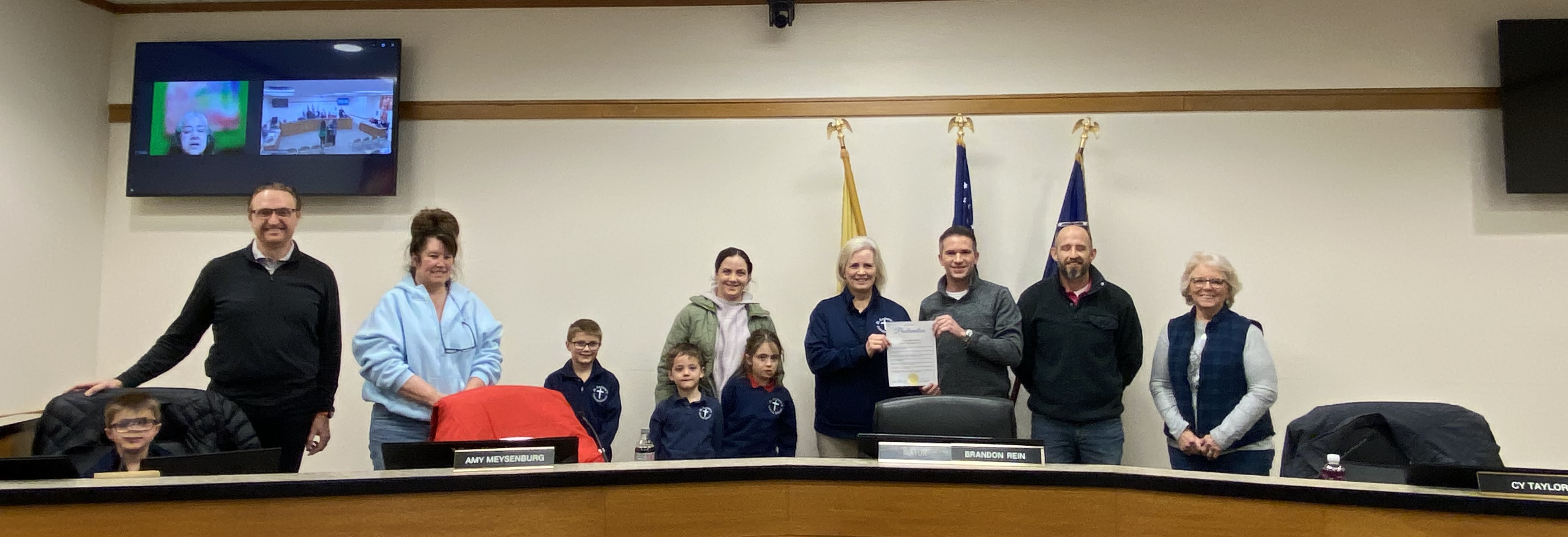 Pictured: Commissioners with St. Andrew’s Catholic School students and staff. 