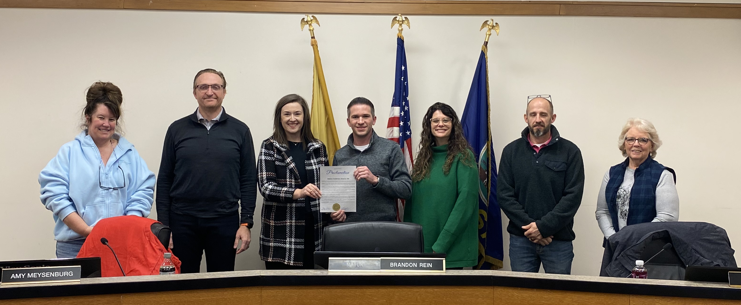Pictured: City Commissoners presenting to Julie Roller-Weeks and Ann Strunk